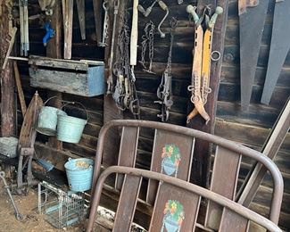 Metal bed 
Saws 
Blue handing tool box 
Buckets 