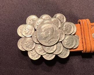 Money belt buckle on tooled belt 
