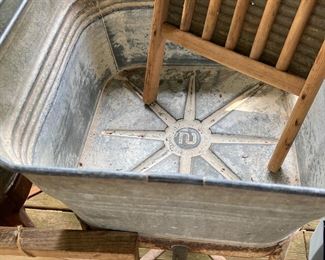 Inside washtub 
Old washboard 