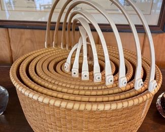 Bill & Judy Sayle nest of Nine Nantucket Lightship Baskets with Bone Handles.