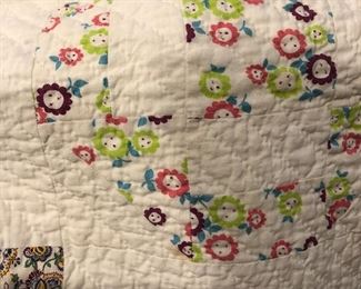 Several adorable quilts