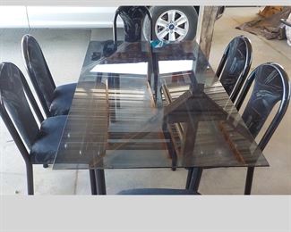 Beautiful Glass Dining Room or Kitchen Table with 6Metal and Cloth Chairs