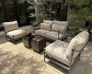 $1500 love seat. $800/each lounge chairs. $500 bronze coffee tables. Bronze frame (Jeffrey Hitchcock Interior Design)