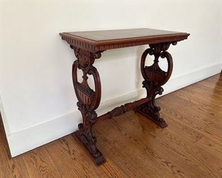 $275 each. Two neo-classical side tables- different cross stretcher carvings.