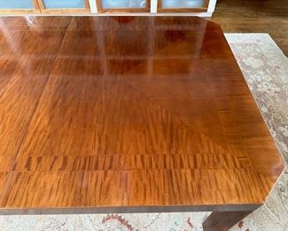 $4000. Baker Furniture walnut dining table, 88.25 (108) x 44 x 29