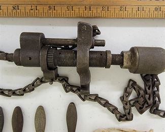 Antique chain-fed drill