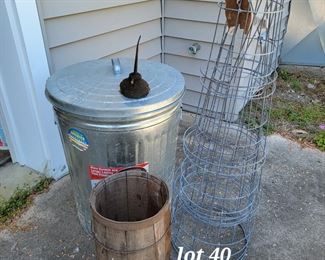 Tomato cages, trash can, nail keg