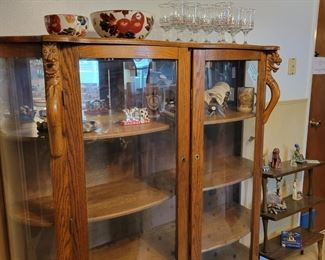 Double oak curio cabinet