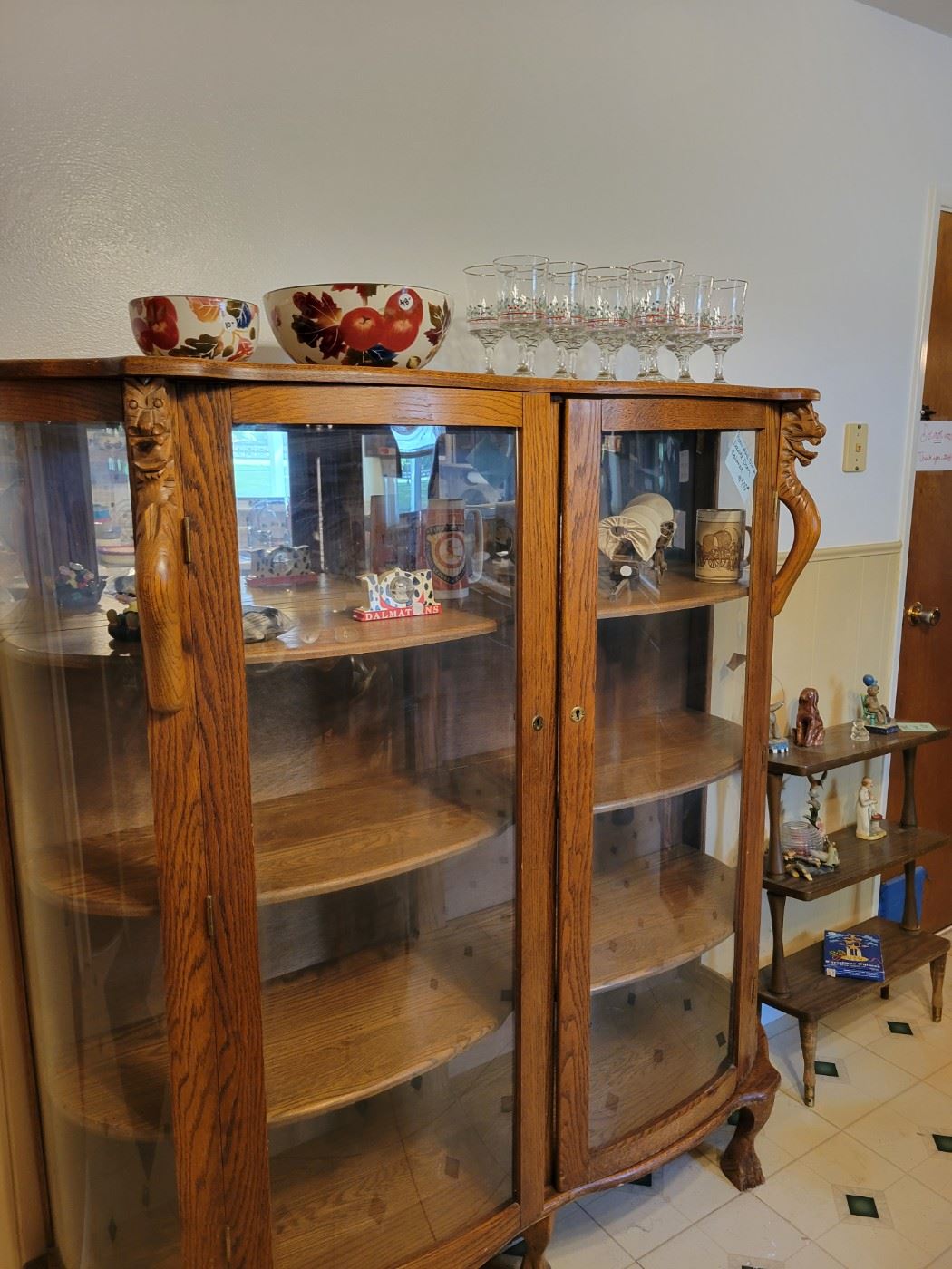 Double oak curio cabinet