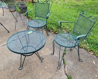  2  iron chairs and small center table.