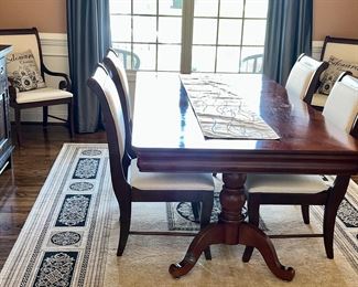 Double pedestal dining room table with Broyhill chairs