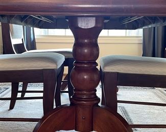 Pedestal with dining table