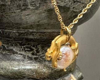 18KT GOLD Carrera Design Jaguar with Ruby Eyes and Button Pearl on 18KT GOLD Rope Chain