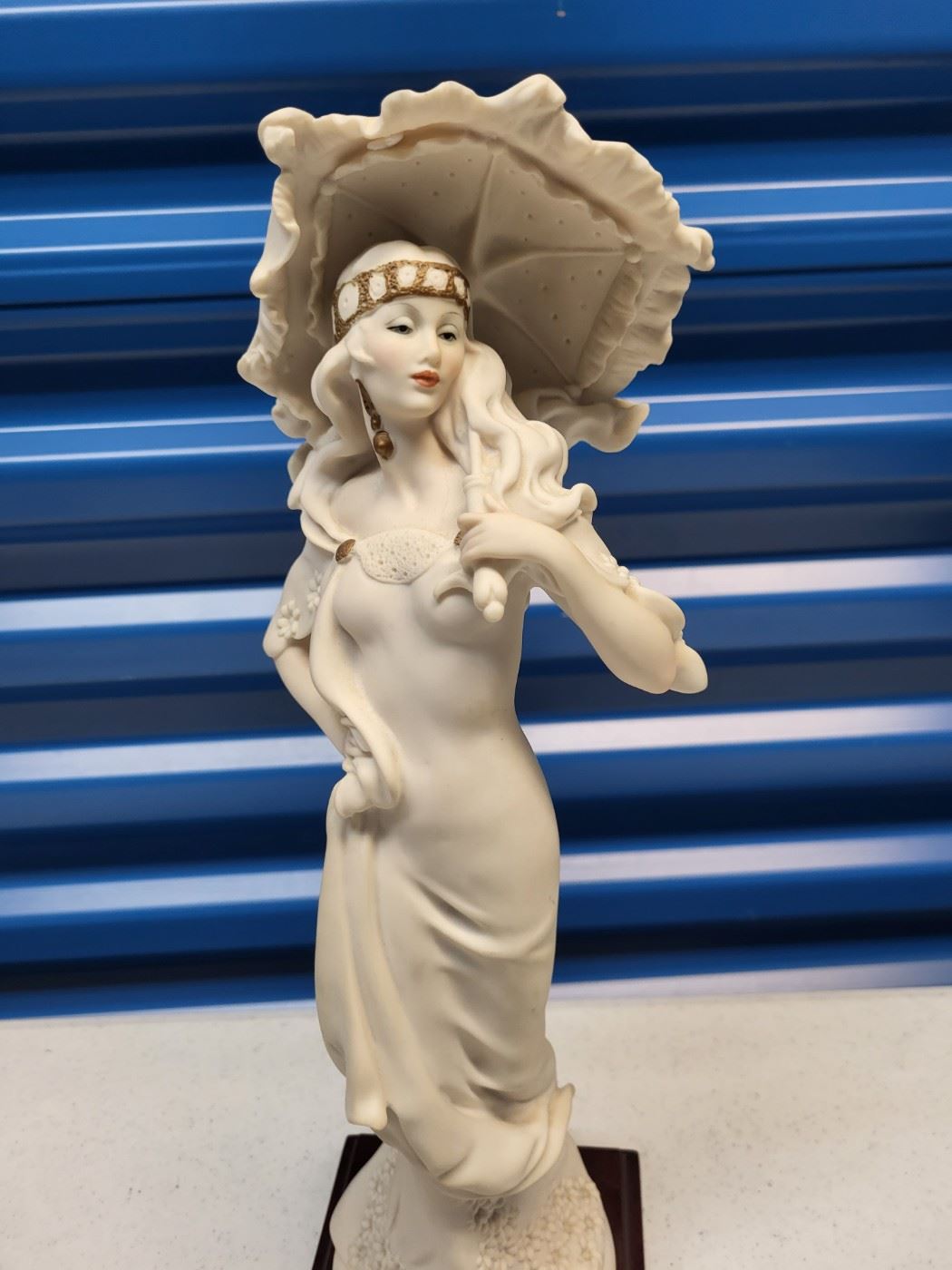 #1 - $50.00 Barnegat - Giuseppe Armani sculpture "Woman with Umbrella"