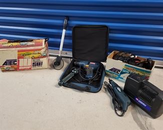 #34 - $80.00 - lot Barnegat - tool lot, includes 4awg jumper/welding cables, Atec 4amp battery charger, Atec 10amp charger 50amp engine starter, 12v air compressor, B&D Wizard rotary tool, Ryobi corded 3/8 drill, walk & measure tool, enercell flashlight