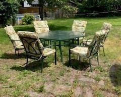 Wrought Iron Patio set with six chairs and cushions