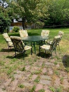 Wrought Iron Patio set with six chairs and cushions