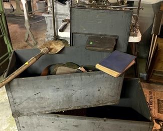 WWII foot lockers with fox hole shovel.