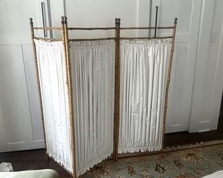 Small folding screen with fabric inserts. 