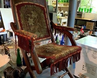 Very old needlepoint folding chair