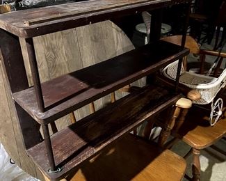 Lots of old wooden wall shelves. C 1930's