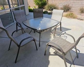 #1912 • Patio Table with 5 Chairs