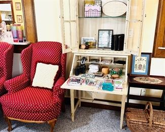 Secretary desk 
Red wing back chairs 