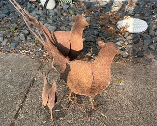Metal bird yard art
