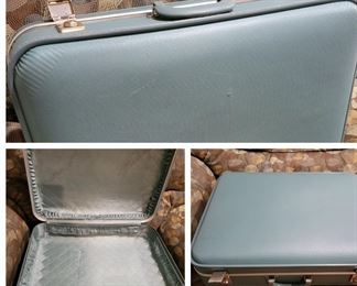 Vintage teal suitcase; good condition