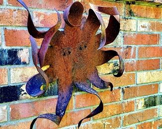 Oxidized Sun garden wall sculpture