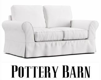 The 60" Comfort Curve Slip Cover Sofa from POTTERY BARN in bright white, $525 or bid #1