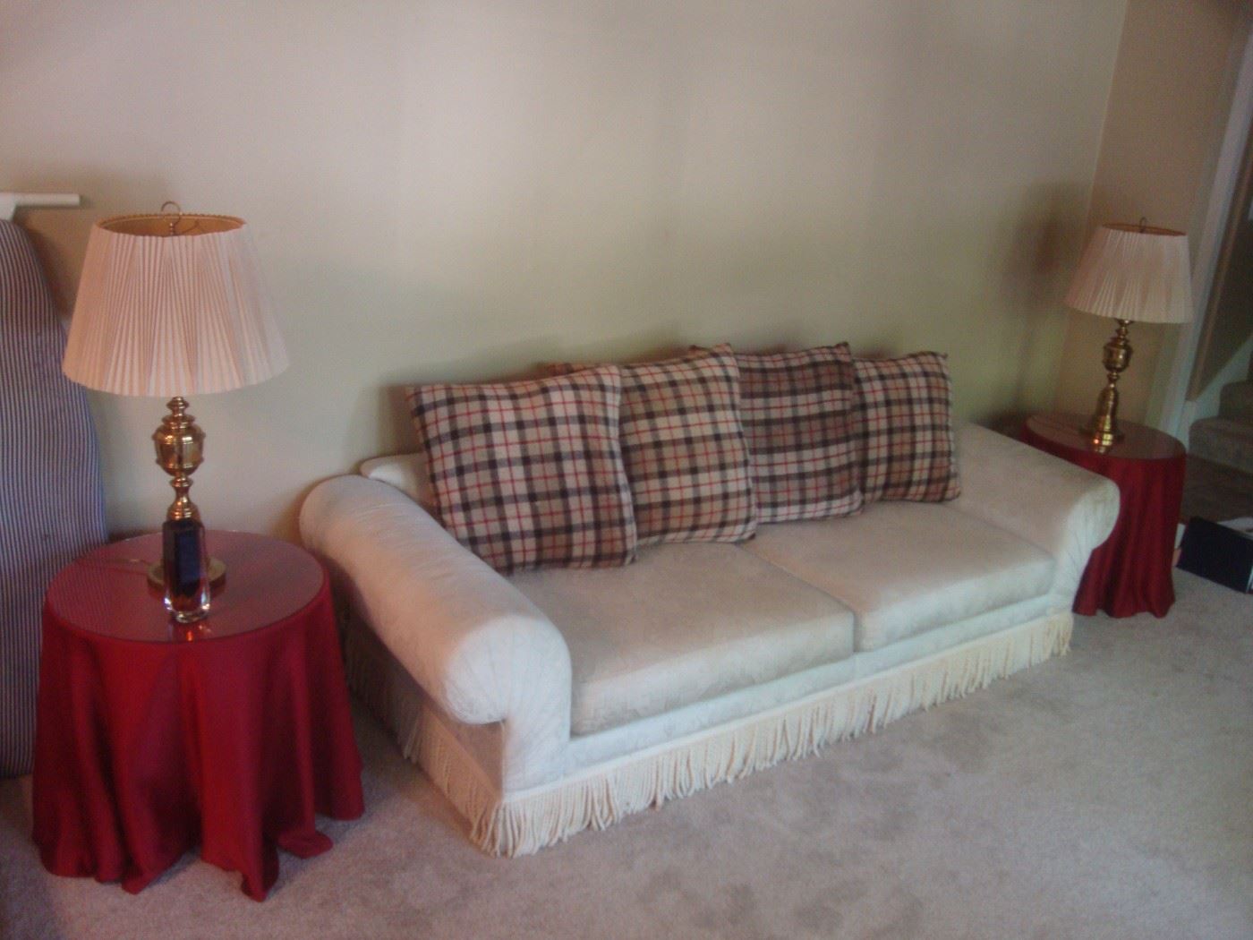 Sofa w bullion fringe & plaid pillows