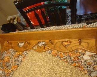 Oak wall shelf w 4 pegs
