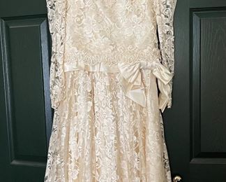 Size 12 Wedding Dress from Jacobsons
Worn once then cleaned and packed away in a box for 36 years.  