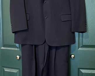 Men’s all wool navy blue suit.
Fitted for a 6’3” ~200 lb. man. 
