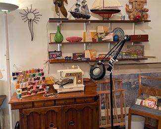 Singer Sewing Machine, Sewing Cabinet l, Thread Holders, Magnifying Glass on Wheels, Sail Boat