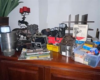 Variety of Cameras, Lens, Film, Cans, 8mm Cameras, Books, Kodak, Poloroid, Cannon, Pentax