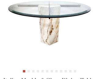 We have this Table in Creamy Marble But Its not put Together (sample photo of what it looks like put together)