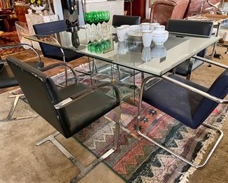 Glass Panel Dining Table by Leon Rosen Pace Collection Two Glass Tops Come with it.
chairs sold separately