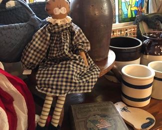 primitive doll, blue basket, vintage book on North Pole