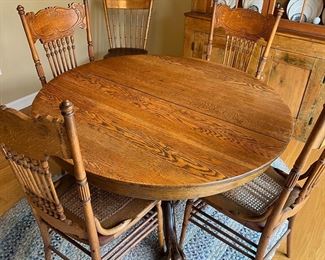 Beautifully refinished antique oak table and chairs