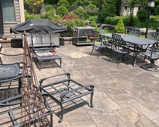 Lots of outdoor furniture with cushions