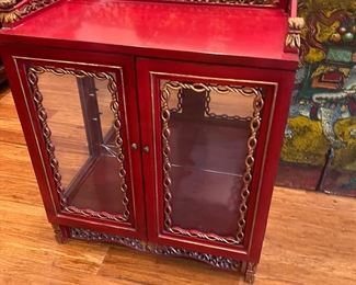 Demure painted curio cabinet