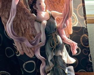 Porcelain Statue: angel and bird 