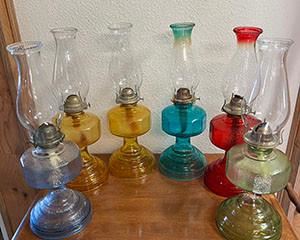 Vintage Eagle Etched Hurrican Lamps. (2 amber, 1 red, 1aqua, 1 blue, 1 green)