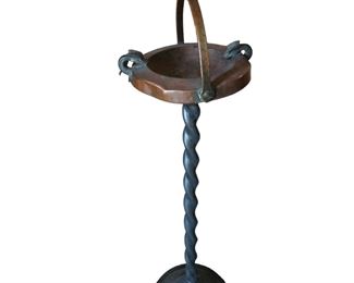 A unique Cast metal and copper standing ashtray