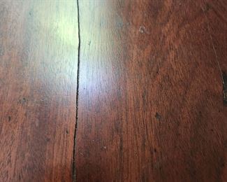 A Period  Tilt-Top, claw foot table hand forged brace 28 inches round by 29 inches