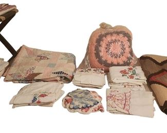 We have vintage quilts and hankies