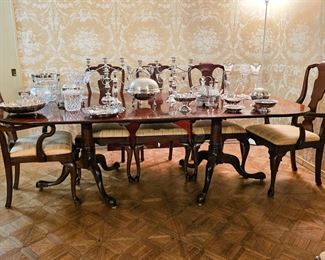 William Tillman dining table with two leaves (one in it) and eight burled mahogany chairs by Henredon (three not pictured) 