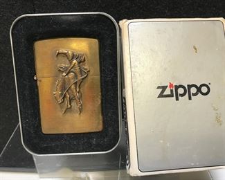 Lot # : 299 - Zippo Lighter - Marlboro Bucking Horse & Cowboy #2
Brass, Discontinued, Never used, tin case with sleeve, genuine windproof, Measures 2 1/4"